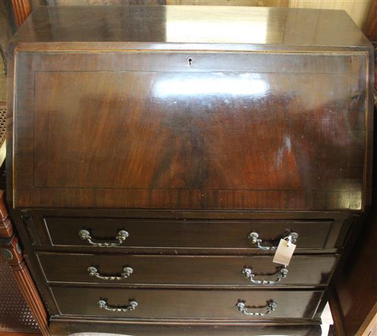 Reproduction mahogany bureau, cabriole legs with claw and ball feet(-)